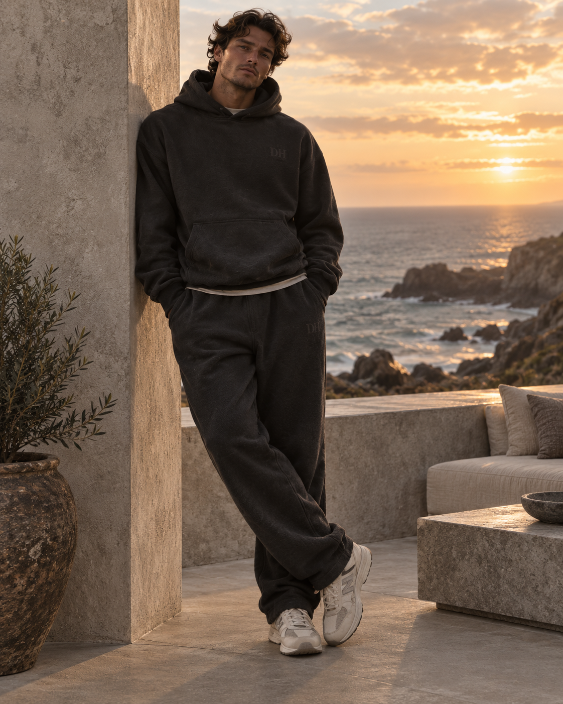 DEVON HALL heavyweight hoodie in charcoal at golden hour