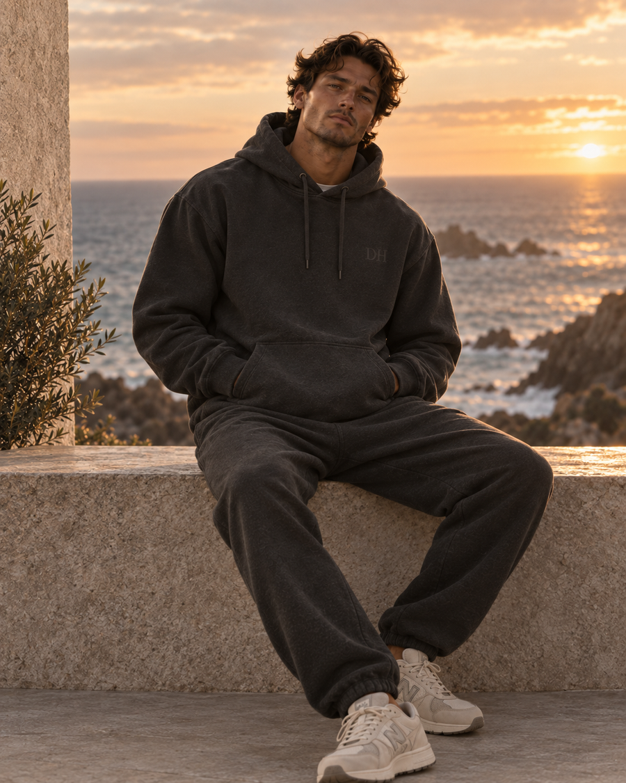 DEVON HALL midweight hoodie in charcoal at golden hour